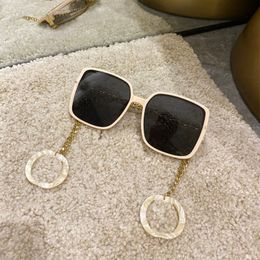 Gafas de sol de diseñador para hombres top concesionales con cadena de oro Fashion Woman Woman UV 400 Eyeglass Polarize Gafas de sol g Gasas de sol