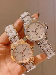 New Women Quartz Wristwatch Stainless Steel Geometric Letter Zircon Watch Female White Ceramic Strap Roman Number Watches Natural Mother of Pearl Dial 33mm