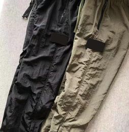 Abbigliamento da uomo Pantaloni da uomo Pantaloni da uomo Marca Viaggia per i pantaloni del sudore retrò dettagli in metallo in mesh in mesh al respiro sciolto i pantaloni di rimpasto per la cerniera per down1996