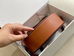 TRIOMPHES mini round box bag Luxury Designer make up fashion Oval Wallet Smooth Calfskin leather women's men handbags Crossbo231Z