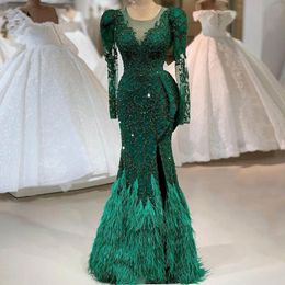 Long Sleeve Mermaid Evening Pageant Dresses Lace Appliques Sequins Feather Sheer O-neck Emerald Green Arabic Dubai Prom Gowns