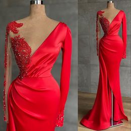 2022 Sexy Prom Dresses Red Lace Appliques Crystal Beads Jewel Neck Illusion Satin Floor Length Side Split Evening Party Gowns Special Occasion Wears Long Sleeves