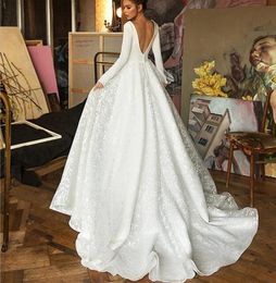 Dubai Elegant Long Sleeves A-Line Wedding Dresses Sheer V Neck Lace Appliques Beaded Vestios De Novia Bridal Gowns With Buttons 403