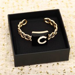 2022 Fashion style Charm top quality opened bangle with white and black enamel design for women wedding Jewellery gift have box stamp PS7038A