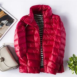 Womens Down Parkas 6XL 7XL Autumn Winter Women Ultralight Jackets Puffy Duck Feather Coats Slim Warm Solid Portable Outwear 220829