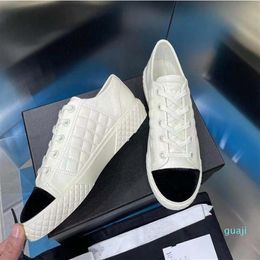 Small white shoes thick bottom lace-up embroidery women's low-top casual sports shoe leather black-white matching flat