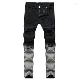 Мужские джинсы мужчины 2022 года по иностранной торговле пограничная скрестная дыра покрыта белая растяжение черные тонкие повседневные брюки мода