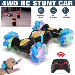 Electric RC Car 4WD 2 4G Stunt RC 360Rotation Drift Gesture Induction Control Twisting Off road Vehicle with Light Music Toy Gift 220829