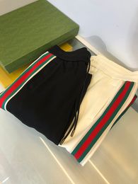 Großhandel Neue Herren -Sporthosen Designer -Stil rot und grünes Band Spleißen Freizeithosen