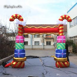 pillar boxes UK - Christmas Inflatable Bouncers Door Blow Up Candy Cane Arch With Gift Box Pillars For Outdoor Entrance Decoration