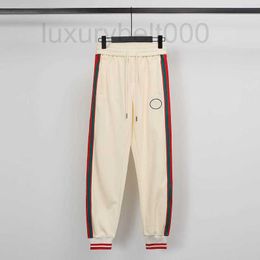 Men's Pants designer 2022 Branded high Embroidered Track pants end great details Beige colour for men and woman JIN2