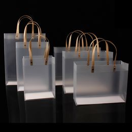 Gift Wrap 10pcs High-quality Semitransparent Plastic Bag Frosted Bags With Paper Handle Hard Package gift bag 221202
