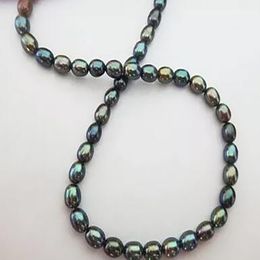 Charming Jewelry 18"9X7mm black Peacock pearl necklace perfect AAAAA