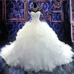 Dubai Arabo Ball Gown Abiti da sposa Ruffles Tiered Gorgeous Plus Size Sweetheart Backless Chapel Train Abiti da sposa Bling Luxury Beading Paillettes Cristalli