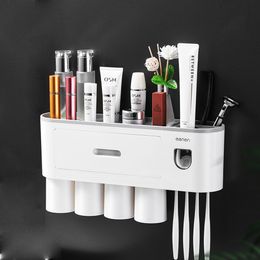 Toothbrush Holders Magnetic Adsorption Inverted Toothbrush Holder With 2 Toothpaste Dispenser Punchfree Bathroom Storage For Bathroom Accessories 221205