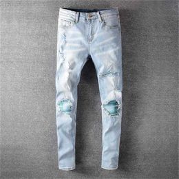 Men's Jeans Designer Mens Cool Style Luxury Fashion Embroidered Patches Denim Pant Distressed Ripped Biker Black Blue Men Slim Pencil Jean Slimxtps