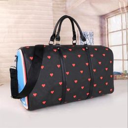 50cm women men bags fashion duffle bag leather luggage handbags large heart pattern capacity sport2344