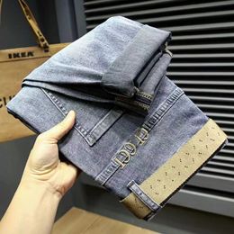 Men's designer jeans high waisted jeans fashion broken motorcycle slim retro to do old patchwork Korean beggar pant