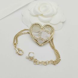 Luxury quality charm bracelet with diamond and heart shape hollow design in 18k gold plated have box stamp PS7431A
