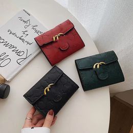 Designer women wallets short folding simple atmosphere change clip all matching small ultra-thin coin