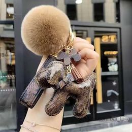 2021 Luxury designer Keychain dog flower Key chain Buckle lovers Car Keychains Handmade Leather Designers Keys chains Men Women Bag baiteng