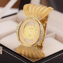 Mulheres Vestido Relógios Quartz Assista a Mesh de Luxúria Vista Oval Bracelelet Gold Liga de Liga de Rhinestone Relógios femininos Whole C286V