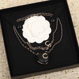 2023 Luxury quality Charm sweater pendant necklace heart shape with black geuine leather long chain have box stamp PS7460A