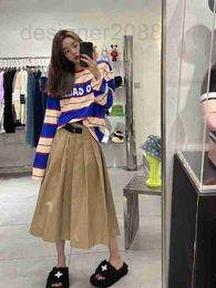 Skirts designer Early autumn new classic A-line triangular leather belt decorative pleated long skirt 62NH