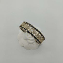 2023 Bracelet de bracelet de bracelet punk de qualité de luxe avec diamant et cuir authentique noir dans un cachet en or 18 km avoir un tampon de boîte PS7480A