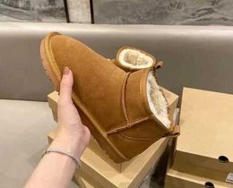 Boots Hot sell Aus Classic Warm Boots Mini Snow Boot Ankle Bootss USA Gs 585401 Women 'S Kids Booties Slippers Warm Bootsugg dfggH