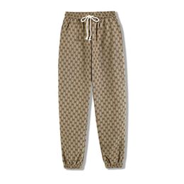 Pantaloni da uomo Lettera Stampa Casual Uomo Donna Tute Pantaloni Pantaloni Moda Hip Hop Pantaloni elastici in vita Taglia asiatica S-2XL