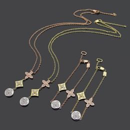 Titanium steel Four leaf pendants gold and silver Full Diamonds Necklace V-letter women's necklace earring set Designer Jewelry V04