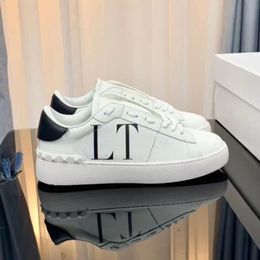 Luxury punk rivet white shoes Joker low-cut flat lace-up sports men's and women's leather skateboard studded fashion casual shoes sneakers patchwork