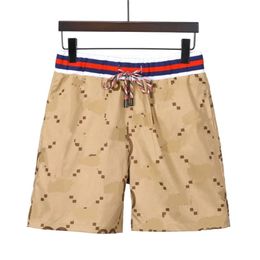 2023 SummerMen's Shorts solid Colour trend fashion quick drying shorts men's beach pants ice silk casual Letter M-3XL