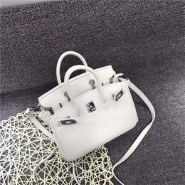 Design Purse new bag mini one shoulder slant cross handbag layer cowhide Star Fashion Silver Buckle