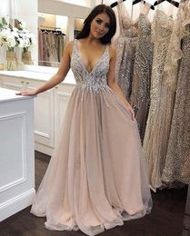 2023 Sexy Arabic Prom Dresses Evening Dress Wear Deep V Neck Silver Crystal Beads Champagne Tulle Sleeveless A Line Custom Plus Size Sleeveless