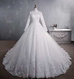 African ball gown Wedding Dresses Dubai Elegant Long Sleeves A-Line Sheer high Neck Lace Appliques Beaded Vestios De Novia Bridal Gowns with Buttons Plus Size