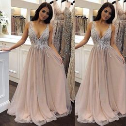 2023 Sexy Arabic Evening Dresses Wear Deep V Neck Silver Crystal Beads Champagne Tulle Sleeveless A Line Custom Plus Size Prom Gowns
