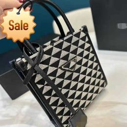 Womens Luxury Designer Handbag 2024 New Tote Bag Triangle Pattern Printed Temperament Handbag Popular Casual Single Shoulder Crossbody Bag Factory Sale