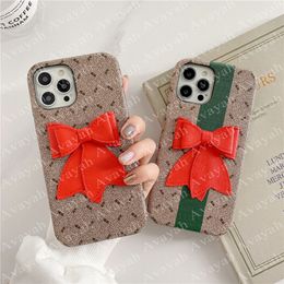 Luxury Red Bowknot Phone Cases Classic Letter Pattern Designer Shell for iPhone 14 13 Mini 12 11 Pro Max X Xs Xr 8 7 6s 6 Plus Girl Handy Cover Gift Cellphone Case