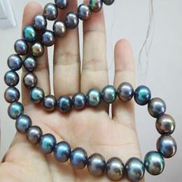 Superb 18"10-11mm Natural Tahitian genuine black peacock round pearl necklace