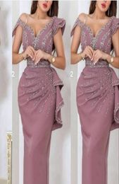 2022 Sexy Dusty Pink Arabic Dubai Prom Dresses Off Shoulder Silver Crystal Beads Cap Sleeves Plus Size Party Evening Gowns Wear Sh2126784