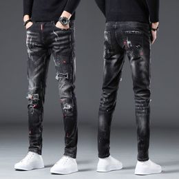 Men s Jeans Korea Version Mens Black Ripped Stylish Slim Stretch Light Luxury Splash Ink Print Sexy Street 221118