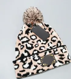 Quality Leopard Print Fur Ball Knitted Woolen hat Female Autumn and Winter Hipster Beanie Hats All-Matching Fashionable Warm Sleeve Cap