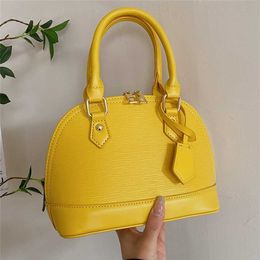 Bags bag new shell women's 2023 spring hand popular solid Colour sling one shoulder texture messenger Purse