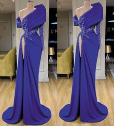 Royal 2023 Designer Blue Evening Dresses One Shoulder Long Sleeves Side Slit Mermaid Lace Applique Beaded Plus Size Pleats Prom Gown Formal Custom Made Vestidos