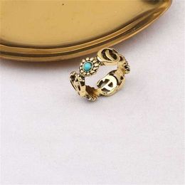 10% OFF 2023 Jewelry fashion personality ring bronze double flower Turquoise Ring for men and women
