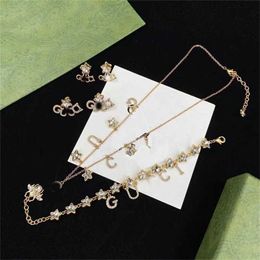 10% OFF 2023 Jewellery letter Pentagram insect Rhinestone Necklace Bracelet Earrings brass minority set