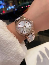Charm Women Crystal Rainbow Diamond Watches Stainless Steel White Ceramic Strap Wristwatch Female Geometric Zircon Number Watch Calendar Clock 35mm