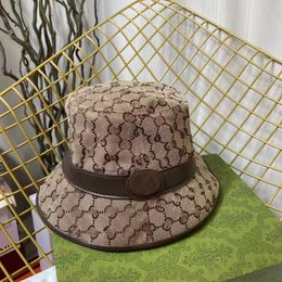 2022 Kutu toz torbalı klasik tasarımcı şapkası siyah kahverengi mavi pembe beyaz Karakter tuvali içeren Şapkalar moda erkek ve kadın güneşlikler Balıkçı kepçesi